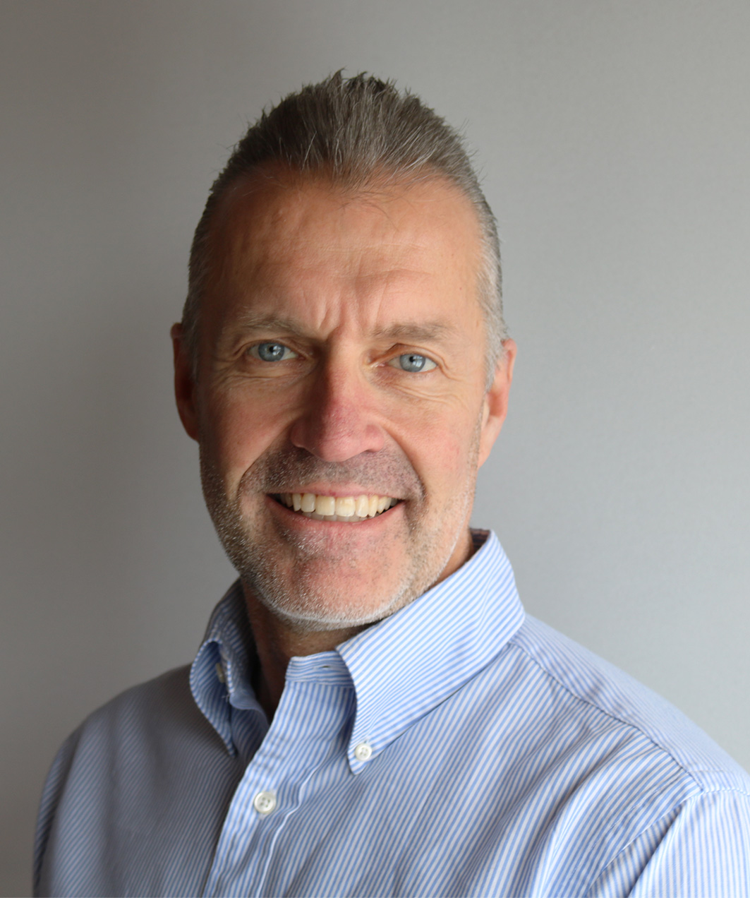 Dave's Headshot - cropped David Tomingas, Principal Engineer. Bachelor of Applied Science in Electrical Engineering and designated Professional Engineer in Ontario since 1989. Electrical Engineering Firm Toronto